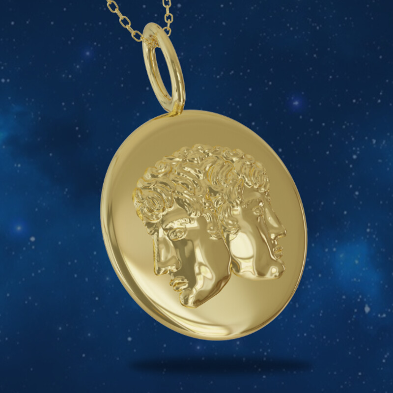 Picture of the stars and a Gemini solid gold pendant.