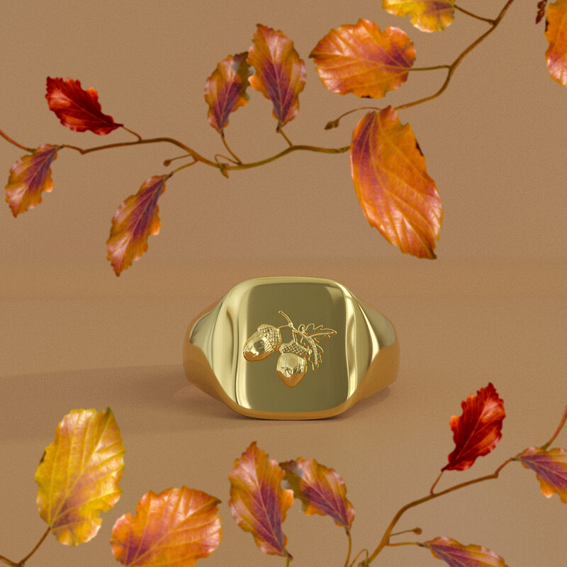 Image of autumn leaves and the Mabon design solid gold ring